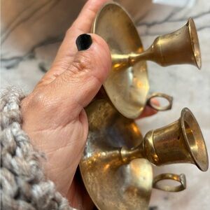 Two brass candle holders